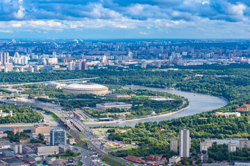Obraz premium Moscow. Russia. Capital is a top view. Panorama of Moscow on a summer day. City landscape of the capital. Architectural tour of Moscow. View of the city massif. Sparrow Hills. Holidays in Russia