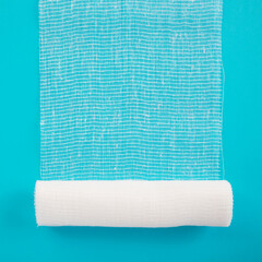 White sterile gauze on colorful background. Sterile bandage.