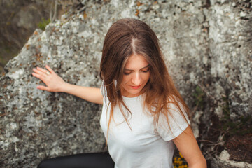 young sexy girl walks in nature