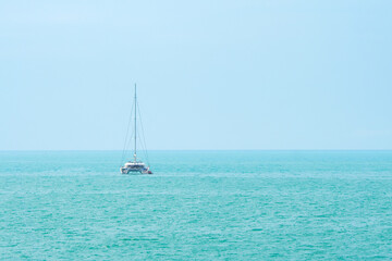 Catamaran boat on the high seas. Catamaran sailing in sea