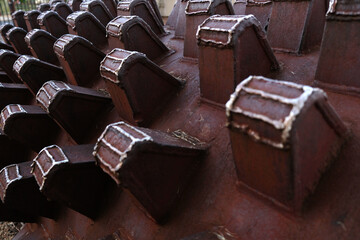Beautiful pattern in an old, rusty metal park roller.