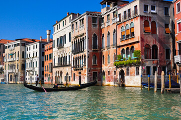 Fototapeta na wymiar Canal with gondola in Venice Italy.