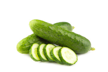 Fresh cucumbers and slices isolated over white background.