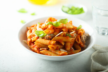 Pasta with chicken, tomato and fresh basil