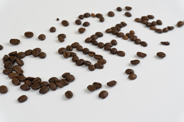 Coffe word lined with coffee beans