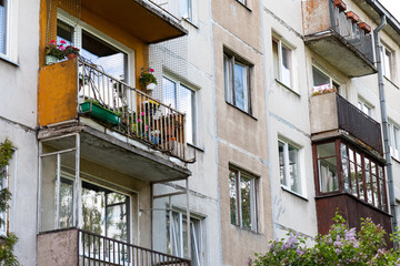 Fototapeta na wymiar Fragment of one of the serial high-rise apartment buildings.