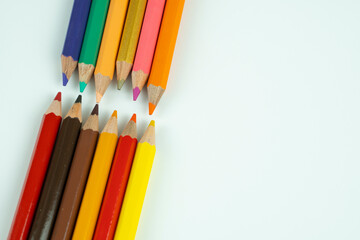 Fototapeta premium color pencils on a white background close-up
