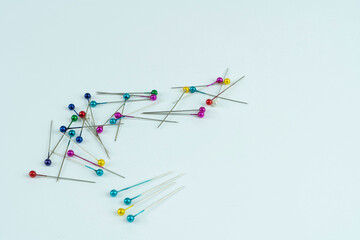 Colored pins isolated on white background 