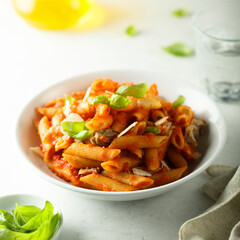 Pasta with chicken, tomato and fresh basil