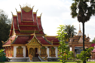 Fototapeta premium Panoramic view of a buddhist wat in Siamese Lao PDR, Southeast Asia