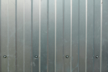 Zinc wall background with self-tapping screw, Zinc metal sheets texture background.