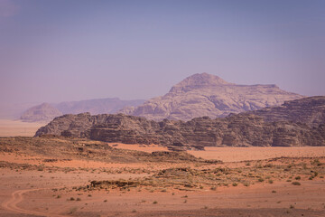 Fototapeta na wymiar Rocky mountains in the middle of desert