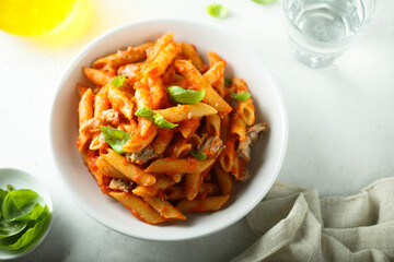 Pasta with chicken, tomato and fresh basil