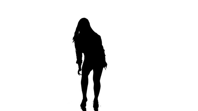 Attractive girl modern style dancer performing. Black silhouette on a white background. Contemporary choreography. Long shot.