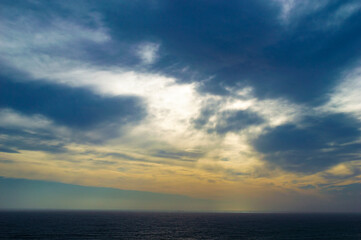 Fototapeta premium Genoa, Italy - CIRCA 2013: Dramatic clouds above Genoa Harbor.