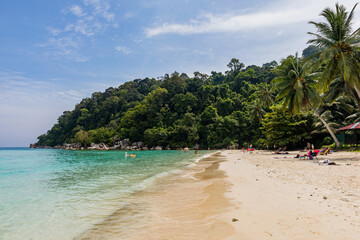 Beautiful tropical beach with white sand and turquoise water on Perhentian Island, Malaysia