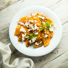 Roasted pumpkin with spices and fresh cheese