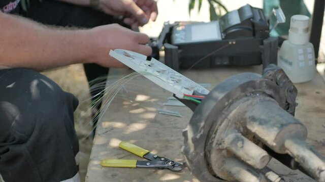 fiber optic cable splice machine closeup