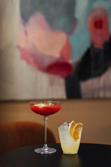 Background with alcohol cocktail at the cafe