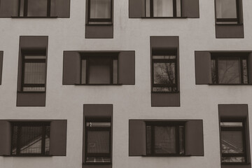 House facade with lots of windows, abstract house facade, black and white, silky contrast