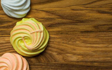 Cakes on a wooden background, photographed from above