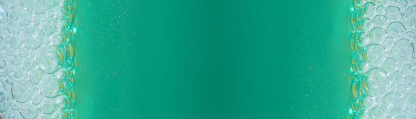 Blurred in soft focus horizontal panoramic background with aquamarine foam