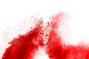 Freeze motion of red powder exploding, isolated on white background. Abstract design of red dust cloud. Particles explosion screen saver, wallpaper