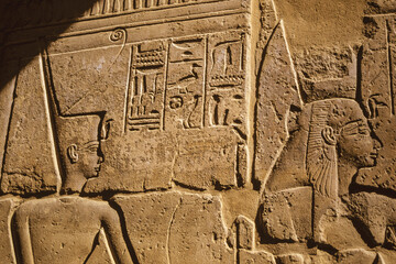 Wall with hieroglyphs in a temple of Egypt