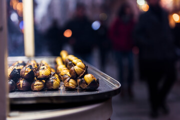 Chestnut seller on istiklal street. Taksim, Istanbul, Turkey. Roasted chestnuts..