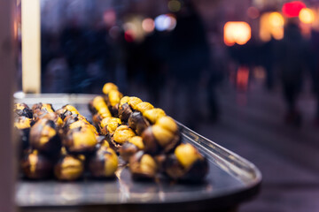 Chestnut seller on istiklal street. Taksim, Istanbul, Turkey. Roasted chestnuts..