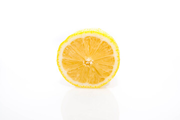 Fresh, healthy half cutted lemon close up shot, isolated on white background