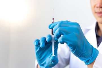 Scientists or doctors collect blood samples from new strains of virus patients for analysis and vaccination in the research laboratory, Vaccine research to eliminate viruses concept.