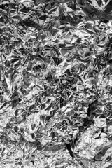 crumpled silver baking foil. texture or background