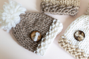 cute knitted beige pompom hats 