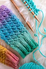 lovely hand ,Ade gloves with knitting needles and wool 