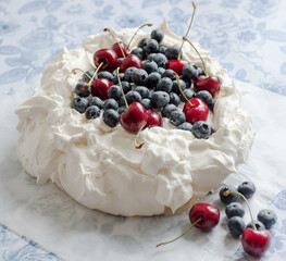 cake with cherries and blueberries
