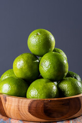 .Various limes in a rustic scene.