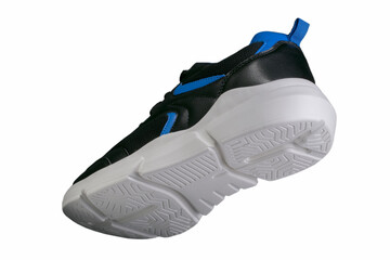 Black sneaker with blue accents on a white sole. Sport shoes.