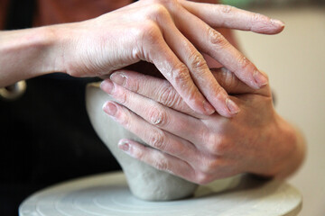 Girl creates a ceramic product in a pottery studio, Saint Petersburg, Russia