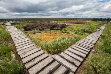 Background old sewage treatment plant.