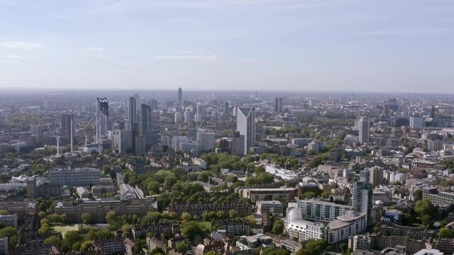 Districts of Central London aerial view, England, within residential neighborhoods such as Waterloo, Elephant and Castle, Borough, Bermondsey, Walworth, Lambeth, Kennington, Vauxhall, South Bank in 4K
