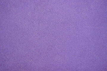 lilac / purple rubber coating of playground background. texture for design