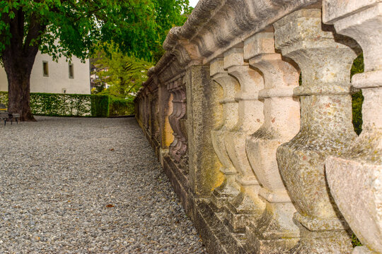 Series of small pillars in a boundary wall. An image of heritage building with strong boundary wall