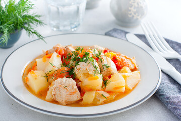 Turkey stew with potatoes, peppers, tomatoes and zucchini, selective focus