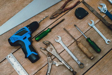 old instruments constructor or renovation for build and repair house on wooden background