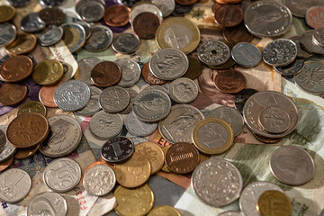 many coins dollar euro ruble yuan franc yen pound zloty rupee