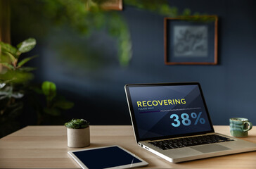 Recovery in Life or Business Concept. Economic Crisis Symbolic. Progressive Bar Loading on Computer Laptop Screen