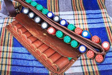 Cartridges for a hunting rifle in a bandoleer