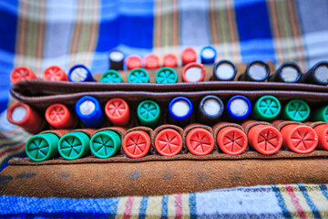 Cartridges for a hunting rifle in a bandoleer