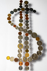 dollar sign made of coins dollar euro ruble yuan franc yen pound zloty rupee crowns